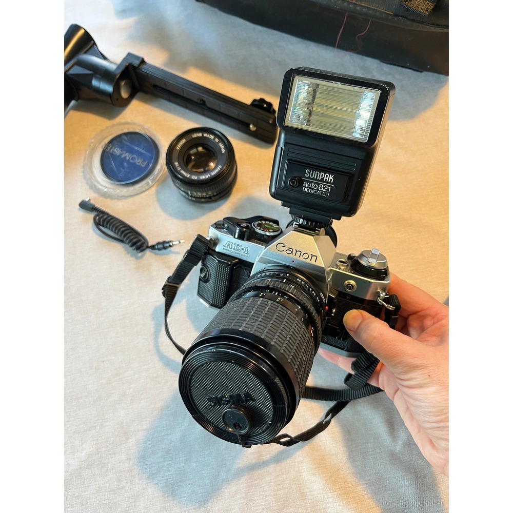 Canon AE-1 Program 35mm SLR Film Camera Bundle with 50mm Lens Flash and Bag